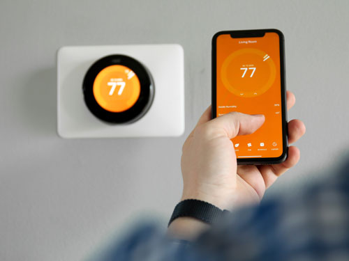 Use a Programmable Thermostat and Adjust Accordingly